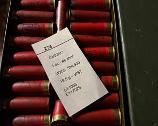 37 army surplus boxes full of shotgun ammo.
