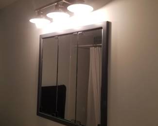 Mirrored medicine cabinet; vanity lights