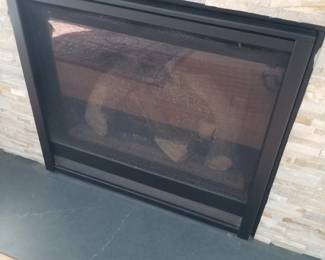 Gas fireplace insert with remote