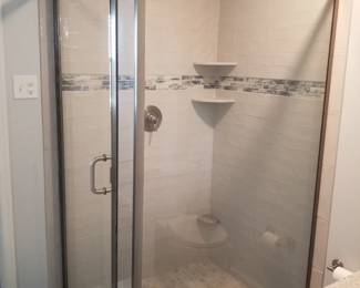 Glass shower surround