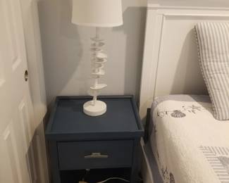 Nightstand; table lamp