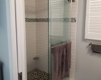 Barn-style glass shower doors