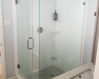 Glass shower surround