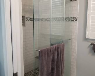 Barn-style glass shower doors