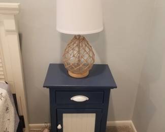 Nightstand; table lamp