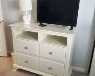 Media console; TV; table lamp