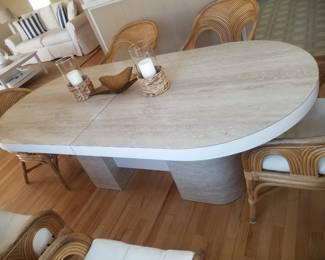 Laminate dining table expands to seat 12.