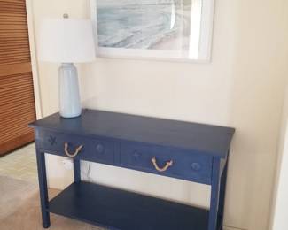 Coastal blue foyer table; table lamp