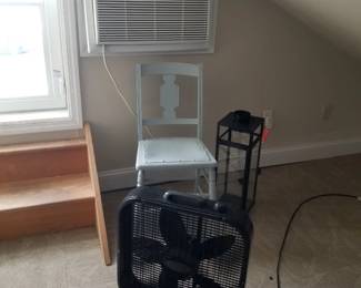 Chair; accent table; box fan; AC unit