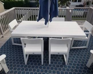 Polywood dining set seats 6; rug