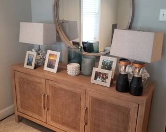 Elegant sideboard; large mirror; pair of faux coral table lamps