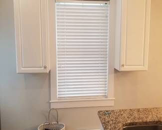 Kitchen cabinets; blinds; windows