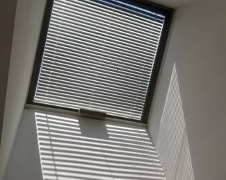Nearly new skylight with remote