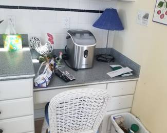 Kitchen features a desk/work space