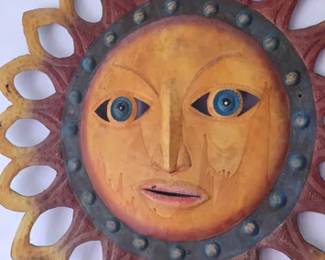 Large painted metal sun wall decor