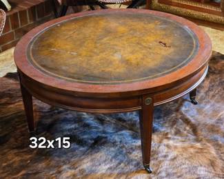 MId Century mahogany cocktail table with stenciled, tooled leather top