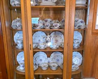 Oak bow front china cabinet and vintage 'Spring Violets' pattern Rossetti china and Bavaria 'Violette' china