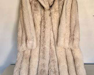 Authentic vintage Saga Fox genuine fur coat with a luxurious shawl collar, full-length styling, and the renowned quality of premium Scandinavian fox fur.