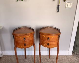 Elegant pair of French-inspired inlaid accent tables with brass gallery rails and graceful cabriole legs—a beautiful addition to any bedroom or living space.