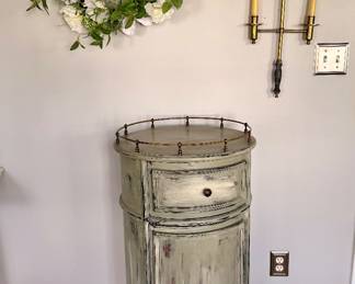 Beautiful distressed accent cabinet with curved front, convenient drawer and storage compartment, perfect for an entryway, bath, or living room.