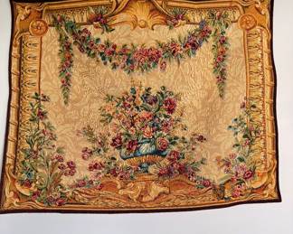 Richly detailed floral tapestry featuring a classic European-inspired design that adds warmth and elegance to any wall.