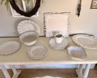 Mix of elegant white serving platters, bowls, and decorative dishes that complement any table setting or farmhouse décor.