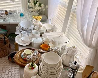 Extensive kitchen collection featuring serving pieces, white ironstone and stoneware, bowls, platters, pitchers, bakeware, casserole dishes, glassware, kitchen tools, entertaining pieces, and everyday essentials. Perfect for stocking a kitchen or adding to a collection.