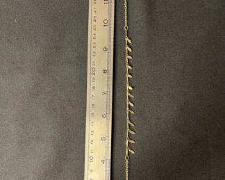 Lot 134: Gold-tone and Silver-tone chain jewelry set