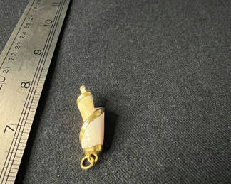 Lot 126: Gold-tone shell pendants and pearl-accent leaf brooch