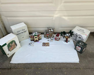 Lot 65: Department 56 Snow Village Christmas ceramic houses and treehouse set in original boxes