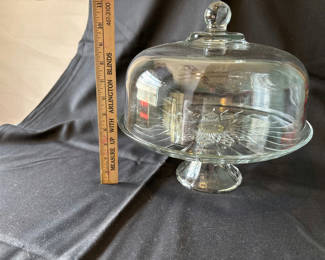 Lot 19: Crystal cake stand with matching dome, crystal candle holders and diamond cut salt and pepper shaker bottles