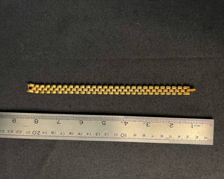 Lot 148: Gold-tone bracelet and blue gemstone pendant necklace