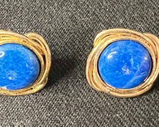 Lot 113: Gold-tone jewelry set featuring blue cabochon earrings and starfish earrings