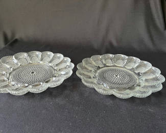 Lot 55: Pair of scalloped-edge, glass, deviled egg serving platters