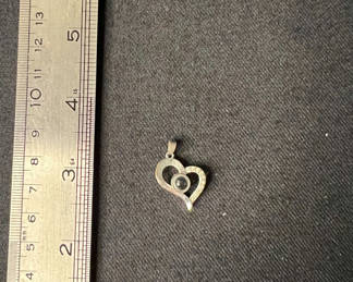 Lot 136: Silver-tone Heart-shaped pendant