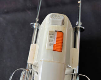 Lot 24: Vintage hand mixer and Antique flour sifter