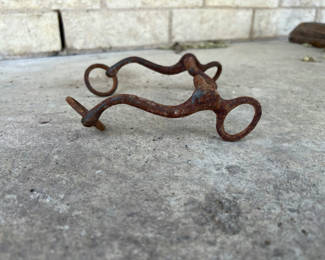 Lot 43: Antique horse bit and Winchester compound bow
