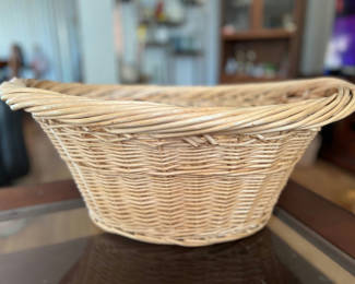Lot 33: Vintage wicker basket with handle, vintage wicker laundry basket and painted farm tote
