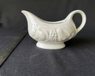 Lot 7: Vintage ceramic grape-pattern gravy boat, and blue embossed glass jar