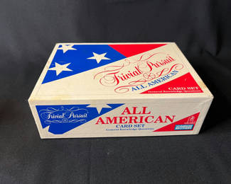 Lot 174: Vintage board game collection including Trivial Pursuit, Backgammon, Checkers, and Planet Hollywood
