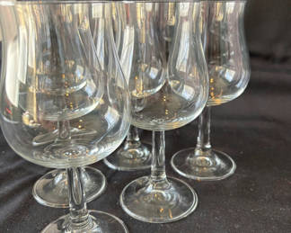 Lot 28: Assorted stemmed glasses and vintage floral porcelain cup with saucer