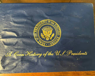 Lot 178: Blue album of U.S. Presidents coins