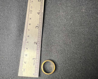 Lot 114: Gold-toned ring and cz-studded teardrop pendant necklace