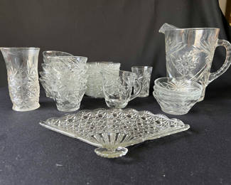Lot 53: Crystal glassware set with starburst pattern