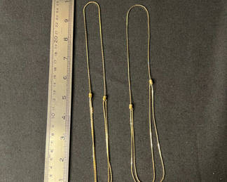 Lot 141: Three Gold-tone necklaces one with heart pendant with Yellow Rose