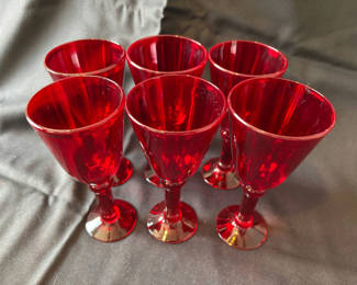 Lot 25: Vintage Red glass goblets, a wooden meat tenderizer, and 2 glass mason containers