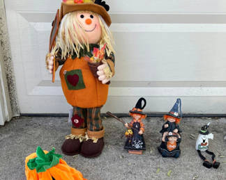 Lot 62: Halloween decorations: scarecrow figure with pumpkins, witches, ghosts, and placemats