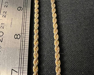 Lot 131: Gold-tone and silver-tone chain necklaces with pendant and varied links