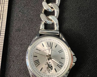 Lot 149: Silver wristwatch with chain-link bracelet and gold-tone adjustable necklace