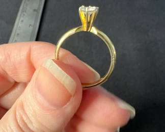 Lot 151: Gold-tone solitaire cz ring and silver-tone two-row multicolor stone ring